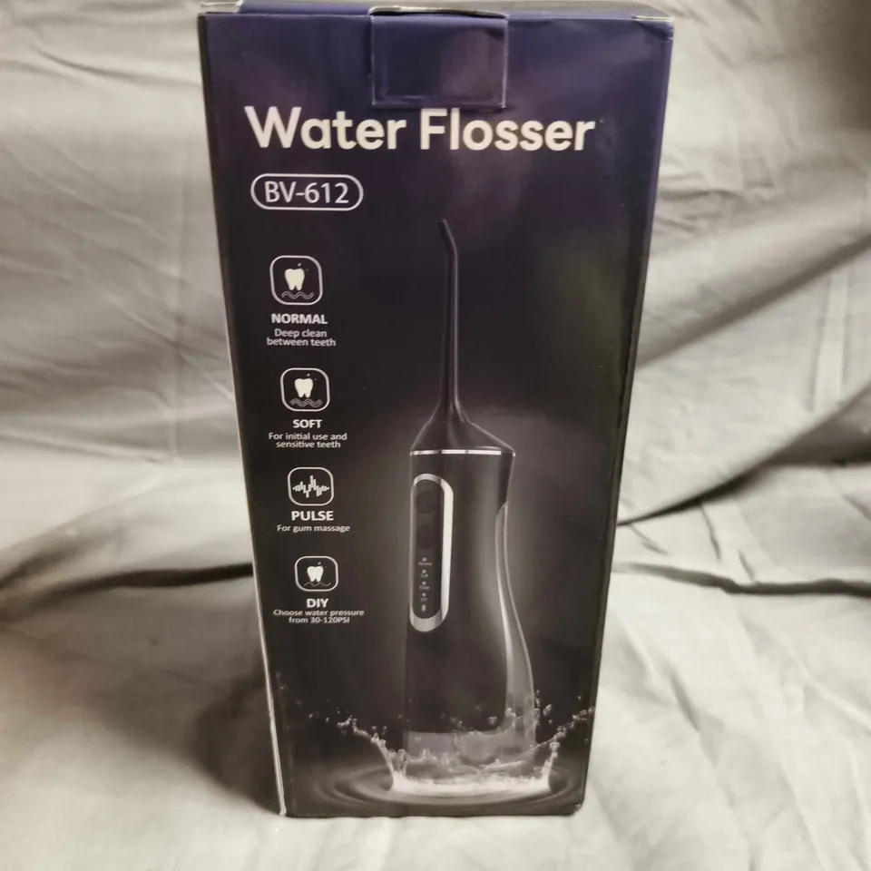 WATER FLOSSER BV-612 – HANDHELD DENTAL IRRIGATION DEVICE WITH USB CHARGING CABLE