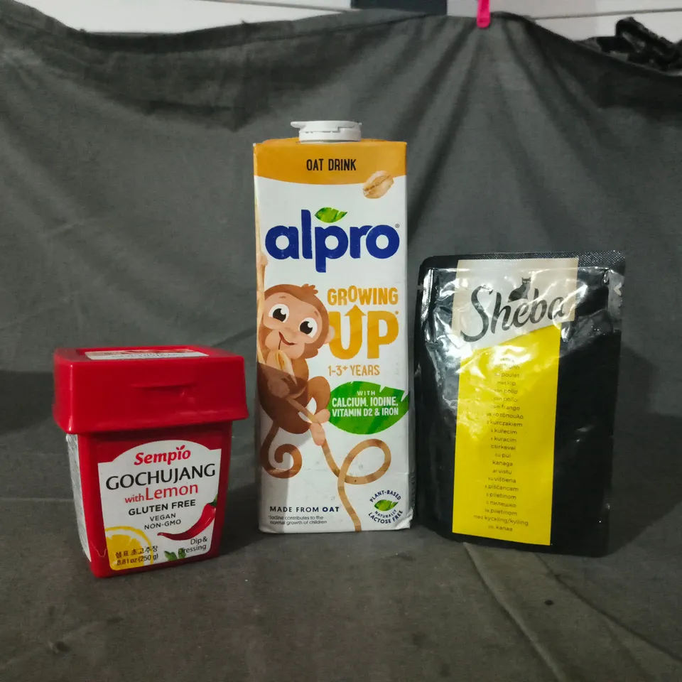 APPROXIMATELY 10 ASSORTED FOOD AND DRINK ITEMS TO INCLUDE ALPRO OAT DRINK, SHEBA CAT FOOD POUCH, ETC