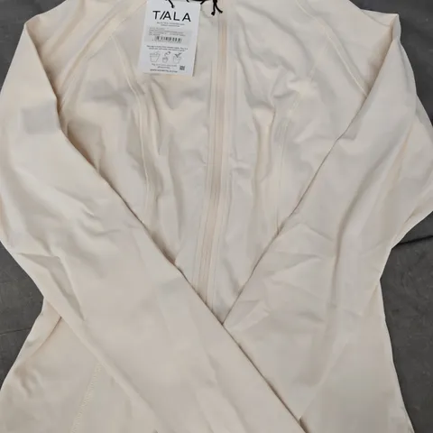 T/ALA DAYFLEX ZIP THROUGH RUNNING JACKET IN BUTTERMILK SIZE MEDIUM