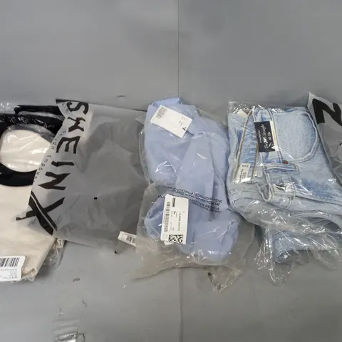 LARGE BOX OF ASSORTED CLOTHING ITEMS IN VARIOUS COLOURS AND SIZES INCLUDING TROUSERS , TOPS AND JUMPERS 