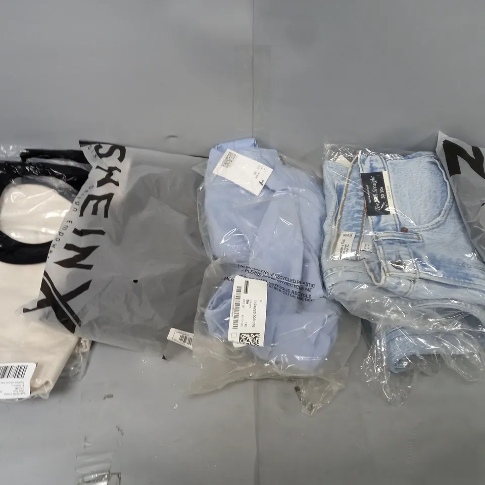 LARGE BOX OF ASSORTED CLOTHING ITEMS IN VARIOUS COLOURS AND SIZES INCLUDING TROUSERS , TOPS AND JUMPERS 