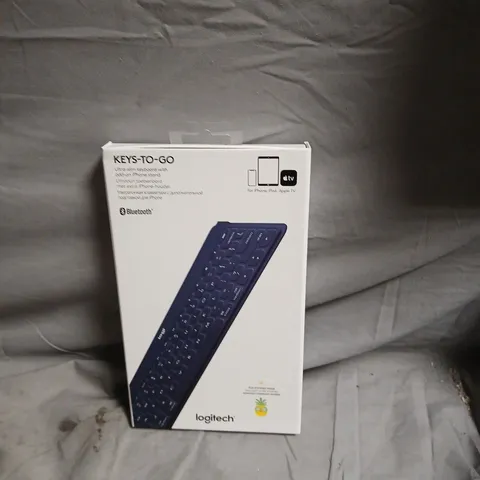 BOX OF APPROXIMATELY 20 LOGITECH KEYS TO GO ASSORTED COLOURS 