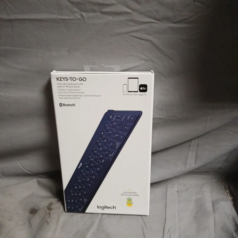 BOX OF APPROXIMATELY 20 LOGITECH KEYS TO GO ASSORTED COLOURS 