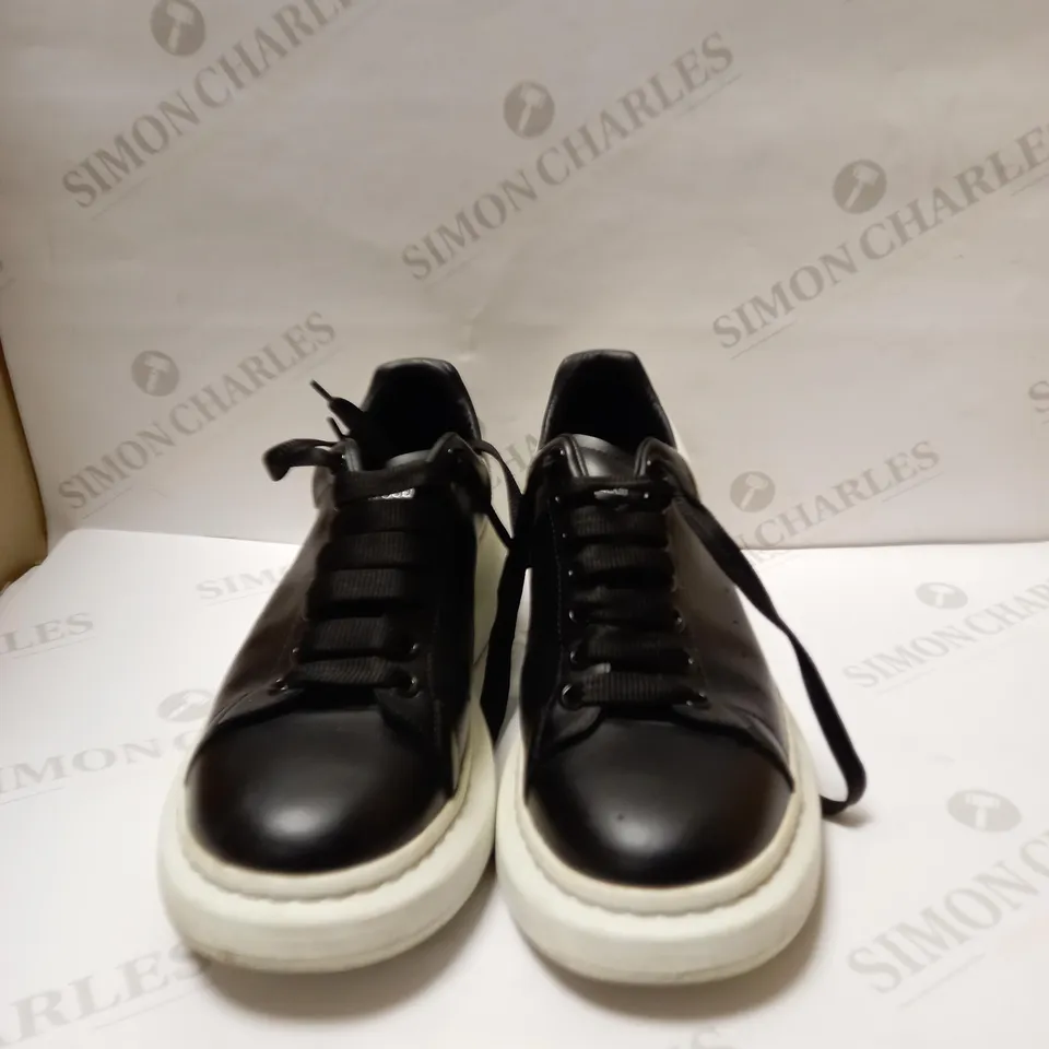 PAIR OF ALEXANDER MCQUEEN SHOW SNEAKER IN BLACK AND WHITE 