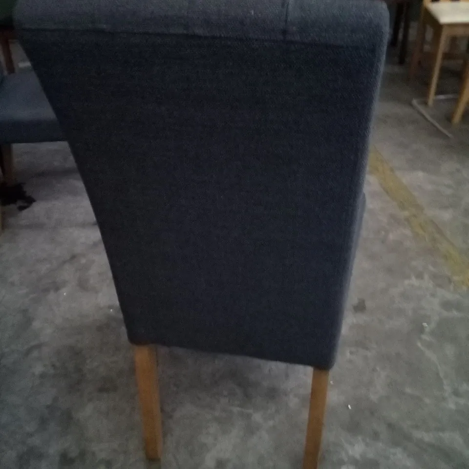 PAIR OF GREY FABRIC BUTTON BACK DINING CHAIRS WITH OAK EFFECT LEGS