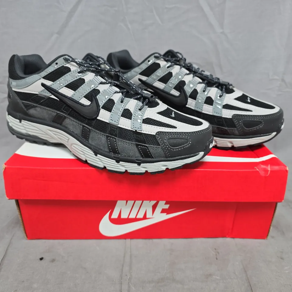 BOXED PAIR OF NIKE P-6000 TRAINERS IN BLACK/GREY SIZE UK 10