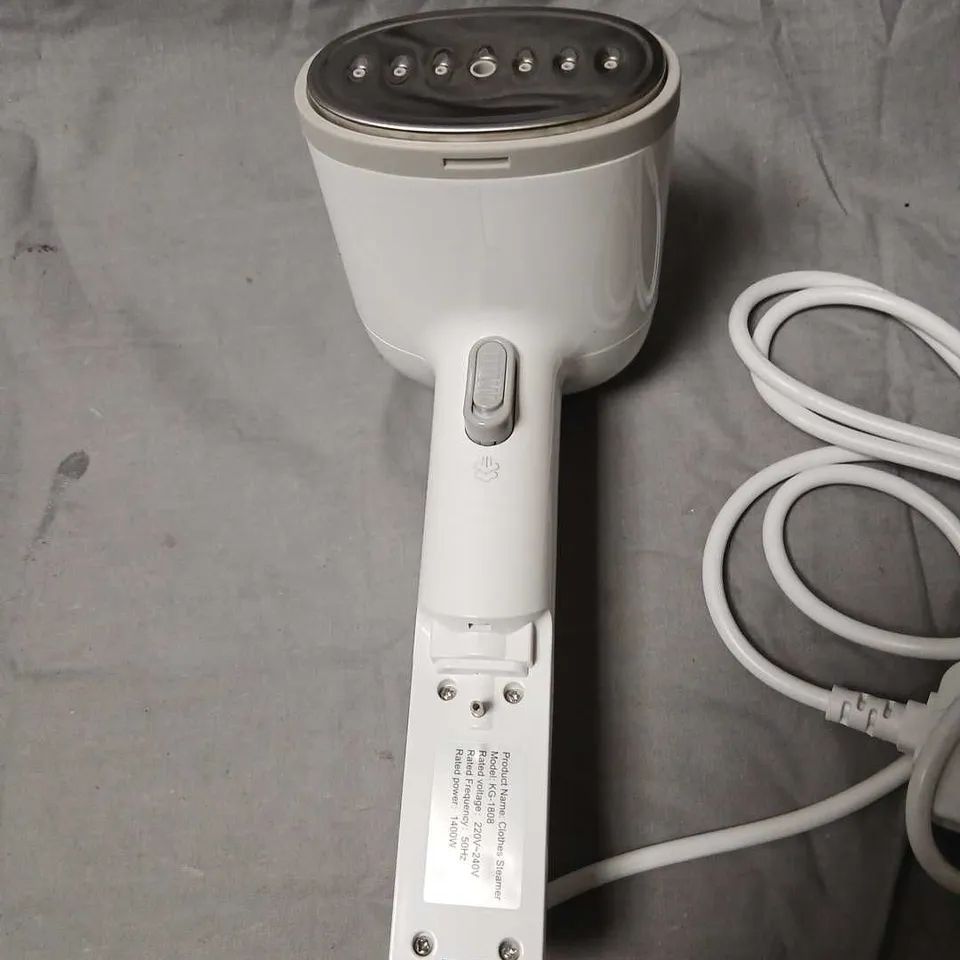 WHITE HANDHELD CLOTHES STEAMER WITH POWER CORD