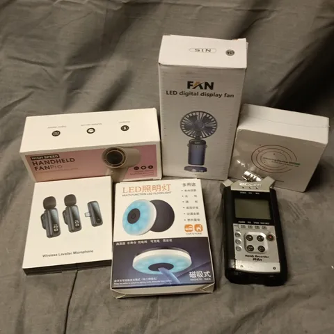 APPROXIMATELY 12 ASSORTED ELECTRICAL ITEMS TO INCLUDE LAVELIER MICROPHONE, LED DIGITAL DISPLAY FAN, HEARING DEVICE, ETC