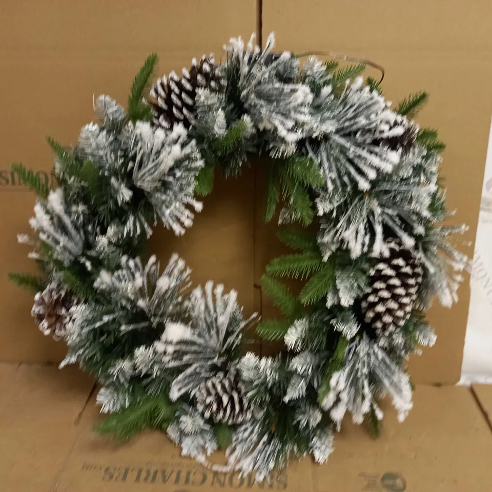 DECORATIVE CHRISTMAS WREATH WITH FAKE SNOW EFFECT AND FAIRY LIGHTS