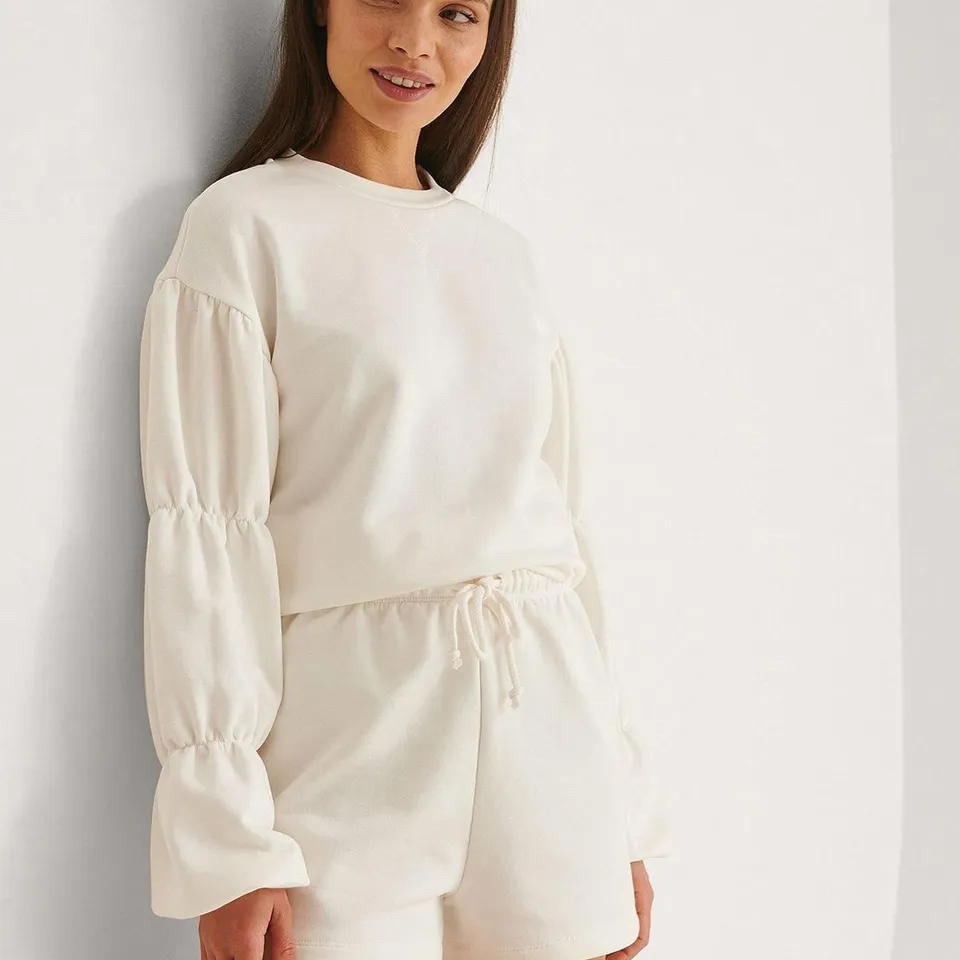 LOT OF APPROXIMATELY 5 ASSORTED NA-KD DETAILED SLEEVE SWEATSHIRTS - BEIGE- XL RRP £125