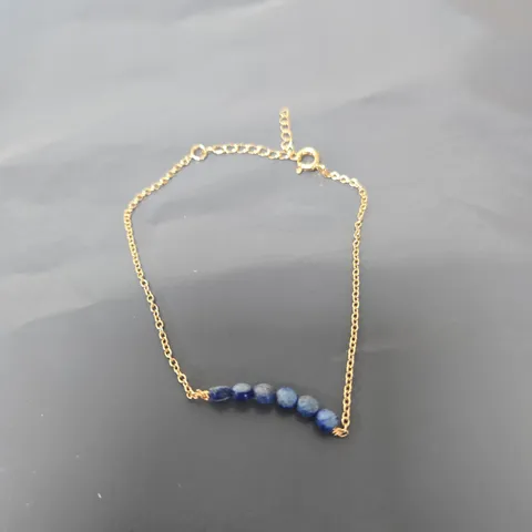 GOLD-TONE BLUE BEAD BRACELET