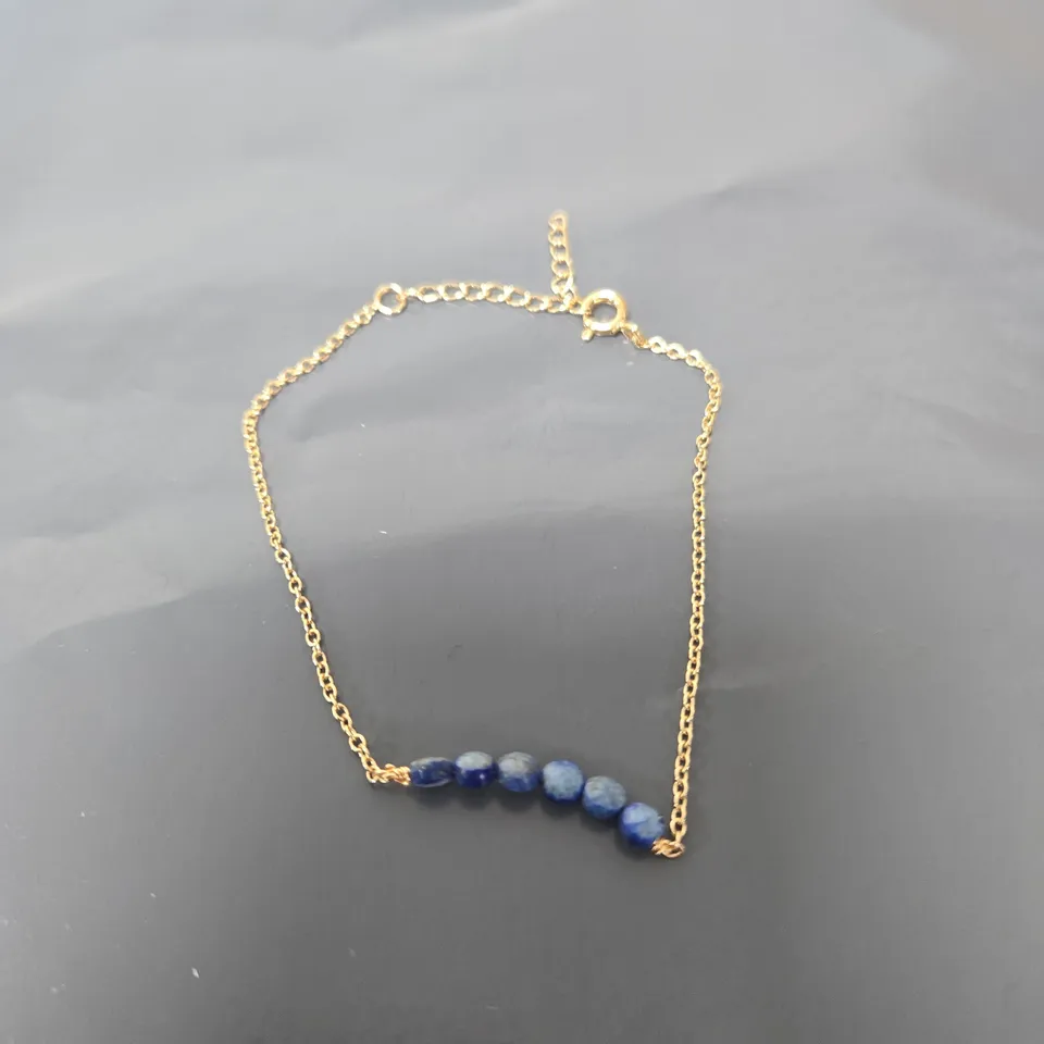 GOLD-TONE BLUE BEAD BRACELET