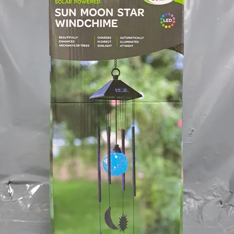 BOX OF APPROXIMATELY ASSORTED CLOTHING AND HOUSEHOLD ITEMS TO INCLUDE SUN MOON STAR WINDCHIME, ETC - COLLECTION ONLY