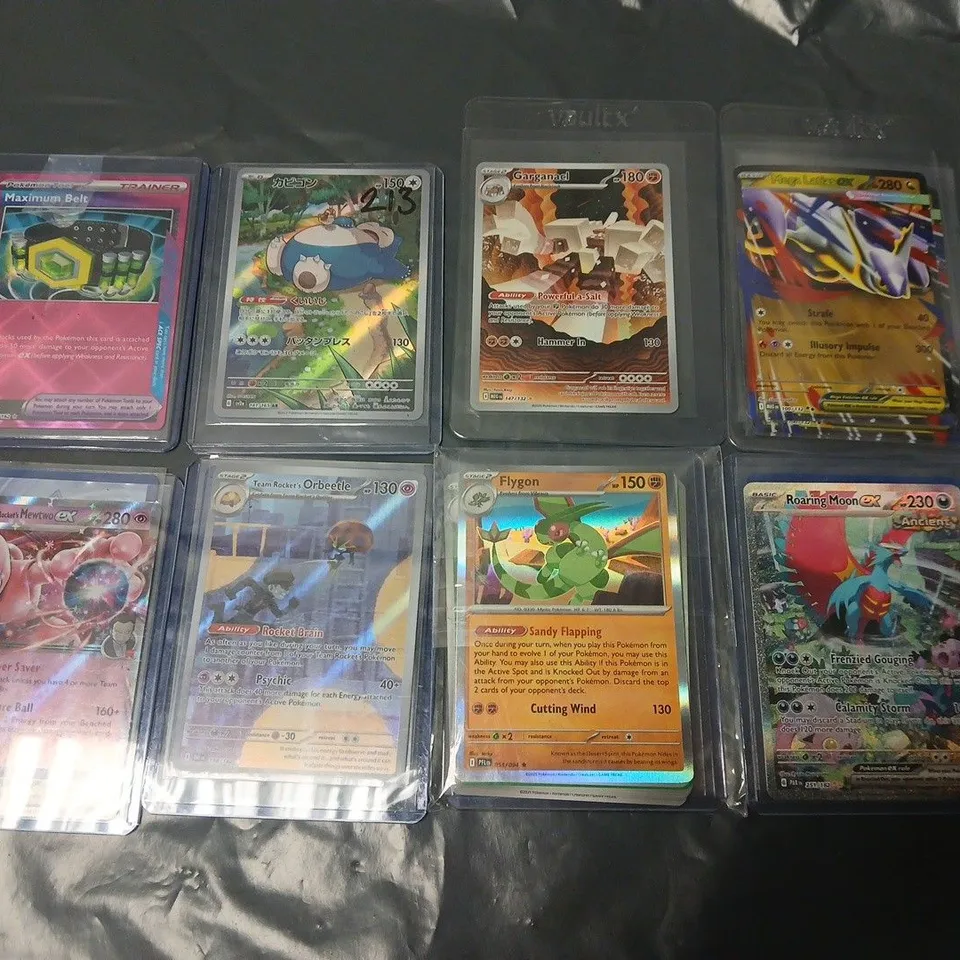 MIXED LOT OF APPROXIMATELY 24 RARER POKÉMON TRADING CARDS