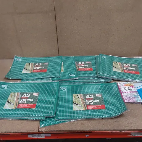 BOX CONTAINING APPROXIMATELY 28x BRAND NEW A3 CUTTING MATS, 1x COLOUR THERAPY SET, 1x FLAG