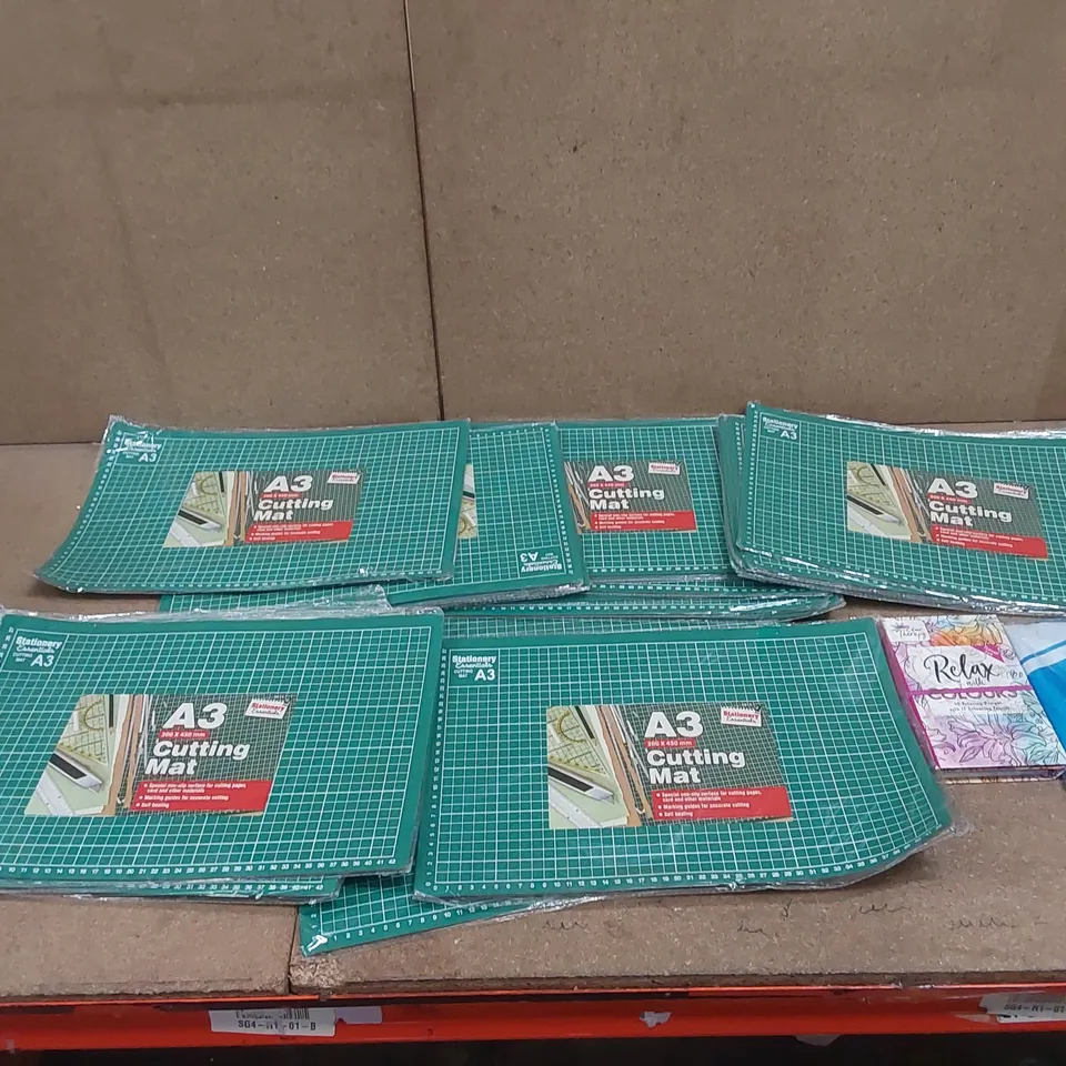 BOX CONTAINING APPROXIMATELY 28x BRAND NEW A3 CUTTING MATS, 1x COLOUR THERAPY SET, 1x FLAG