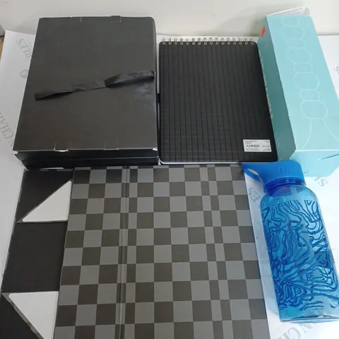MEDIUM BOX OF ASSORTED HOUSEHOLD ITEMS TOO INCLUDE BOTTLES , CALENDERS AND CANDLES
