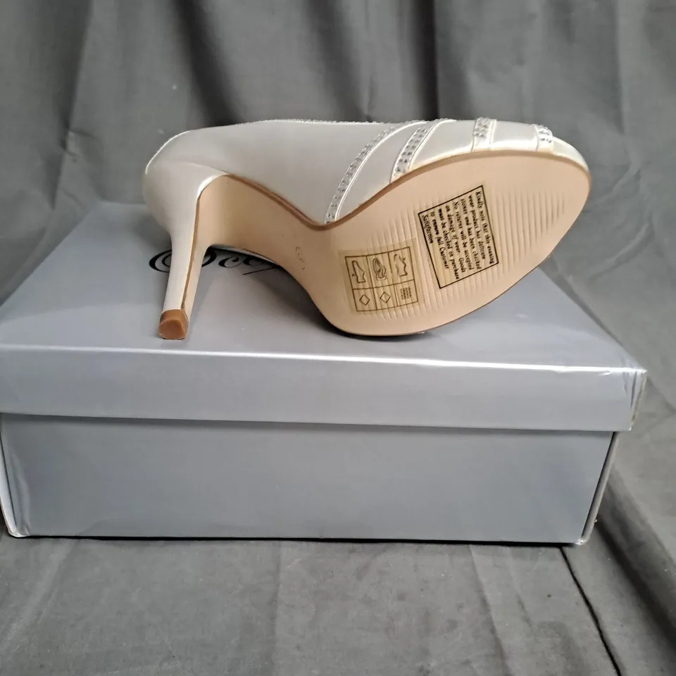BOXED LOT OF 13 PAIRS OF LADIES OCCASIONS BY CASANDRA HIGH HEELED SHOES. VARIOUS SIZES