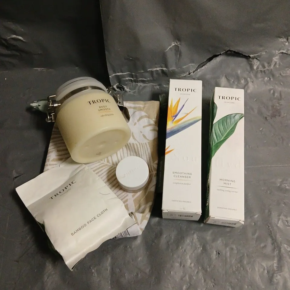 TROPIC SKINCARE LOT OF 5 ASSORTED PRODUCTS TO INCLUDE - MORNING MIST SOOTHING TONING ESSENCE - SMOOTHING CLEANSER - LIP SMOOTH SOFTENING SCRUB - ETC