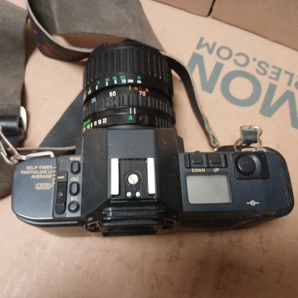 CANON T70 35MM SLR CAMERA WITH ZOOM LENS