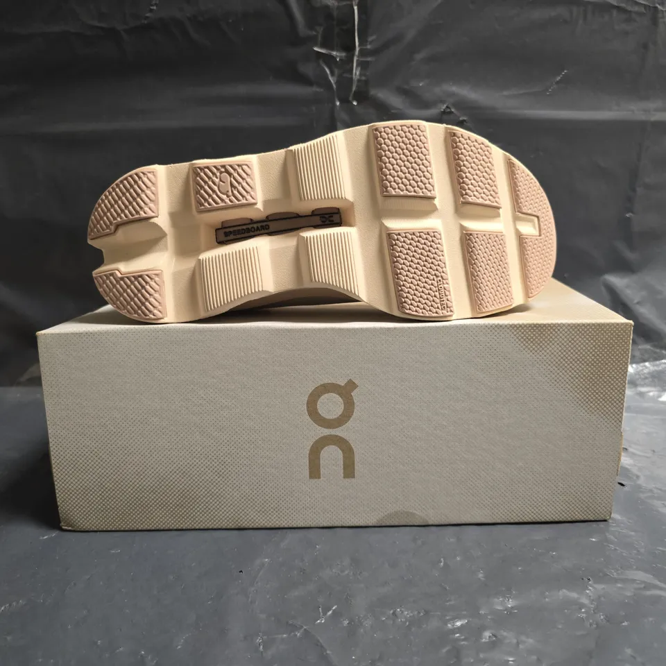 BOXED PAIR OF ON CLOUDMONSTER TRAINERS IN MOON/FAWN SIZE UK 5