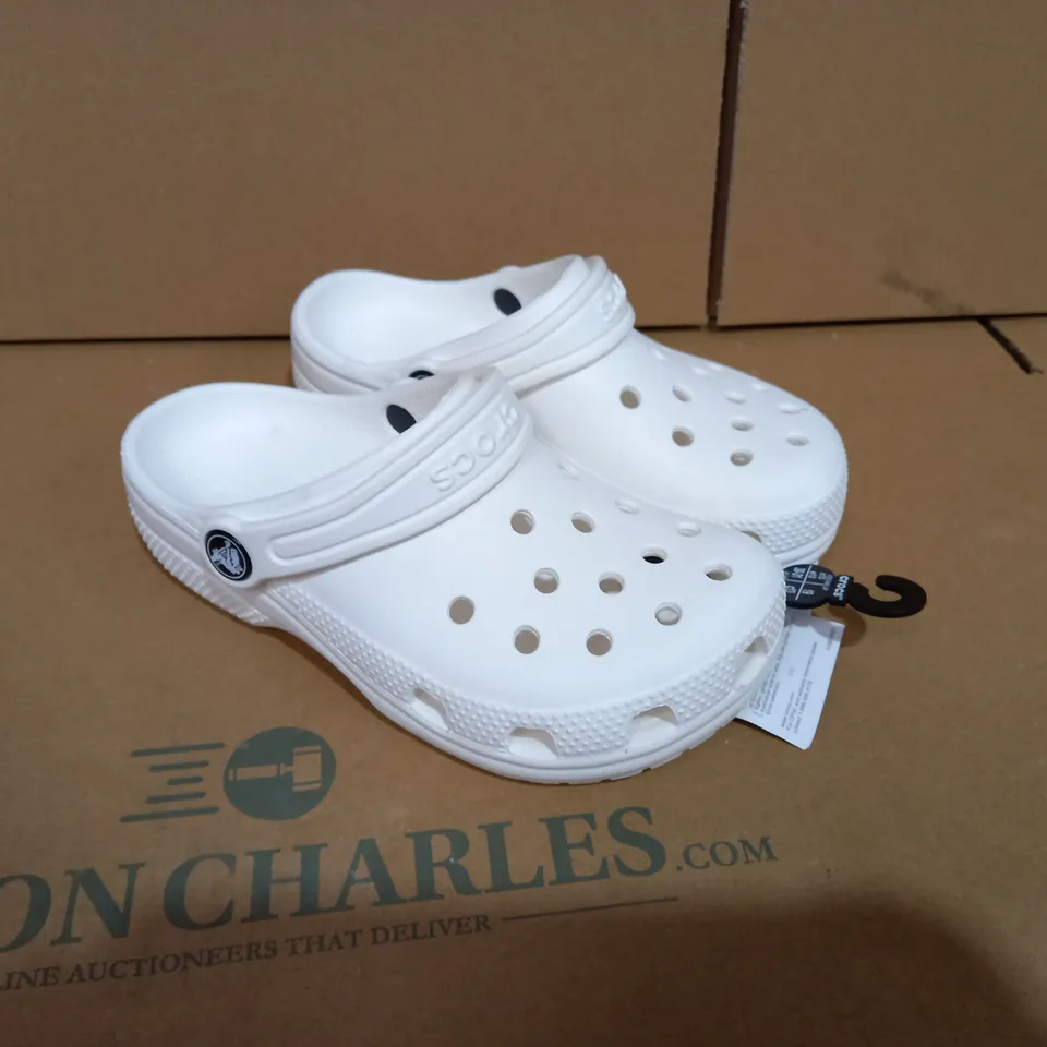 PAIR OF SIZE C13 WHITE CROCS