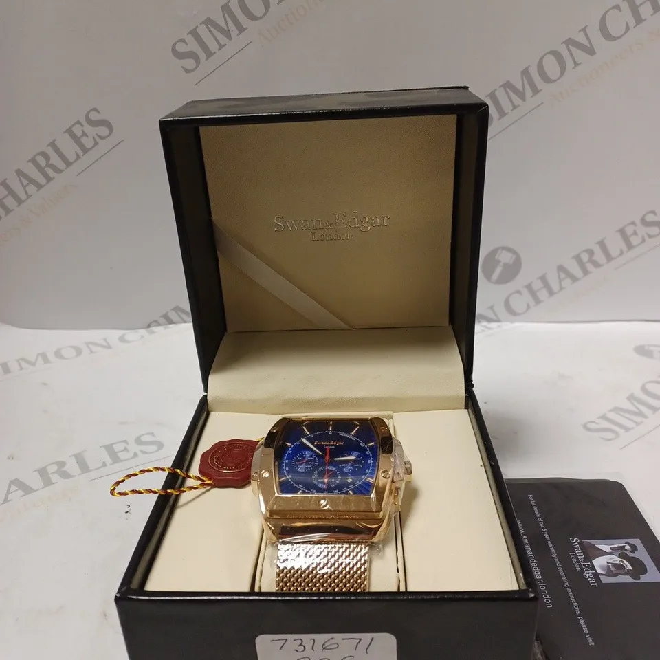 SWAN&EDGAR WIDE GOLDEN WATCH WITH BLUE FACE BOXED 