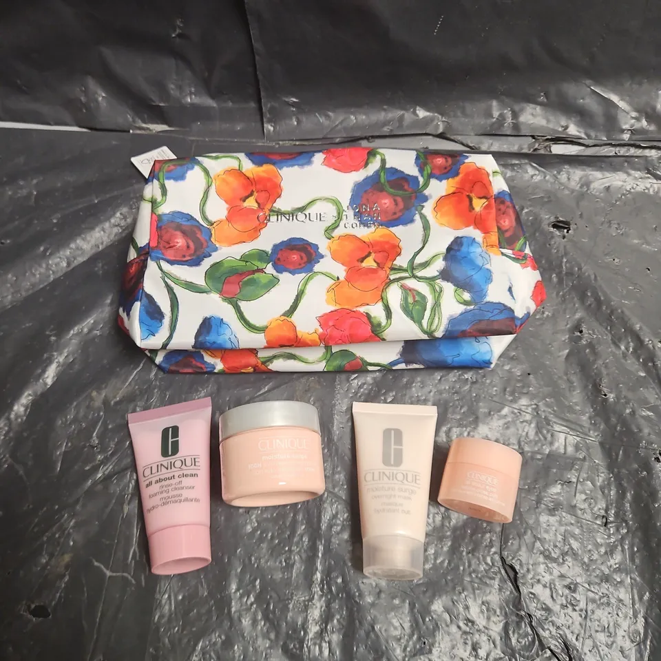 CLINIQUE LOT OF 5 ASSORTED COSMETIC PRODUCTS TO INCLUDE - MAKEUP BAG - MOISTURE SURGE OVERNIGHT MASK - ALL ABOUT EYES - ALL ABOUT CLEAN CLEANSER - ETC