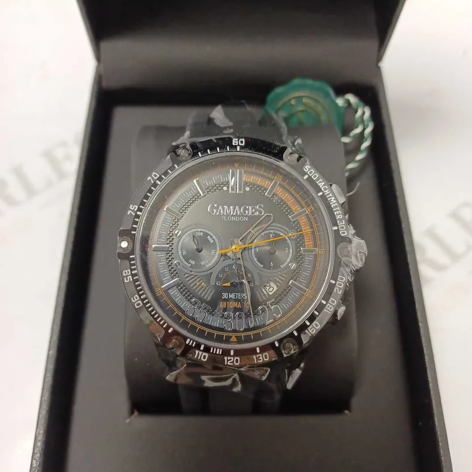 GAMAGES MECHANICAL RACER BLACK TRIPLE DATE DIAL AUTOMATIC TACHYMETER RUBBER STRAP WRISTWATCH	