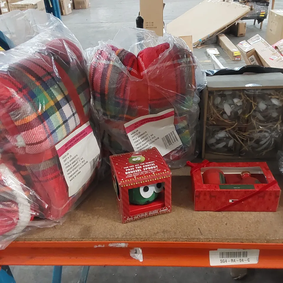 LARGE ASSORTMENT OF CHRISTMAS PRODUCTS TO INCLUDE; CANDLES, STOCKINGS, THROWS, CUSHIONS ETC