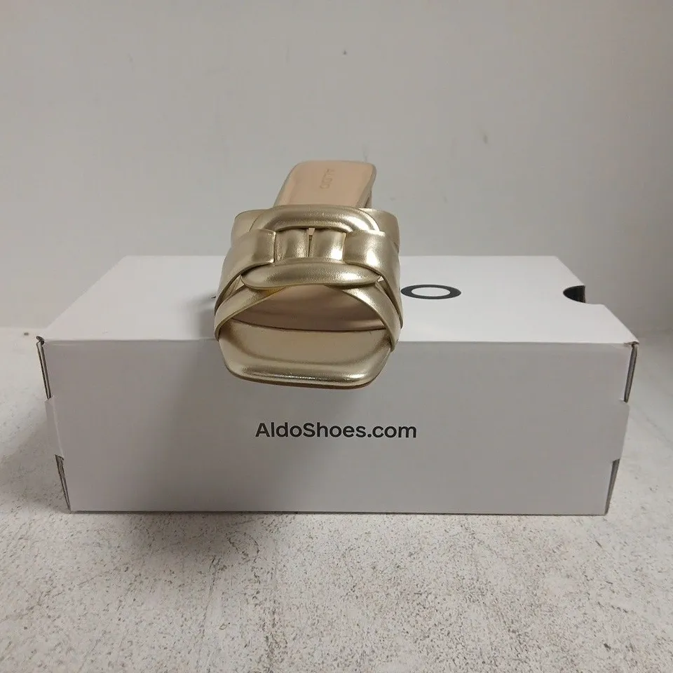 BOXED PAIR OF ALDO OPEN TOE LOW BLOCK HEEL SANDALS IN METALLIC GOLD SIZE UK 7