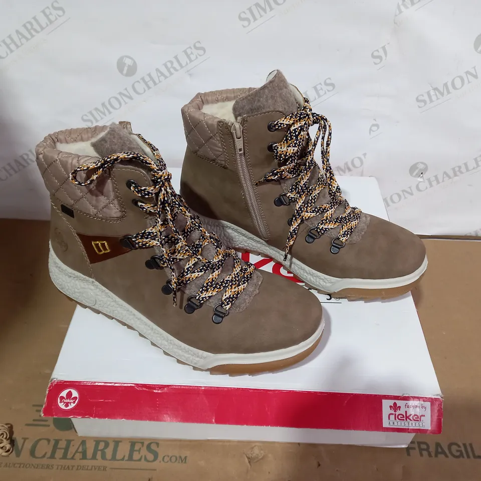 BOXED PAIR OF RIEKER BOOTS- SIZE 40