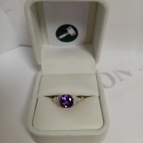 DESIGNER 9CT GOLD RING SET WITH A CUSHION CUT AMETHYST AND DIAMONDS WEIGHING +-1.58CT