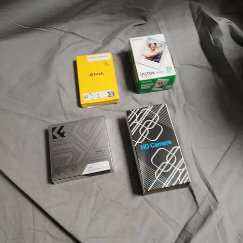 BOX OF ASSORTED ITEMS INCLUDING K&F CONCEPT NANO‑K ND FILTER 67MM + HD CAMERA PROTECTOR + INSTAX MINI FILM (20 SHEETS) + JETTECH IPHONE CASE PACKAGING + FUJIFILM INSTAX MINI BOX