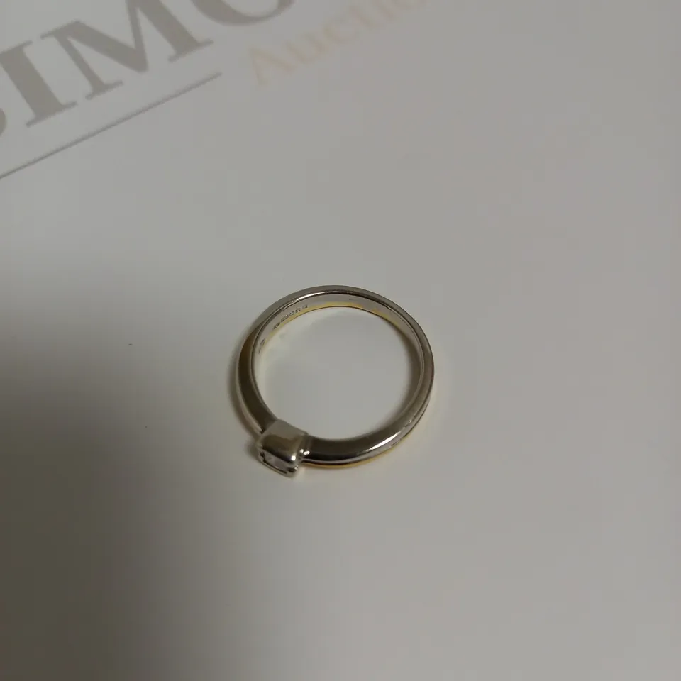 DESIGNER 18CT GOLD RING SET WITH A PRINCESS CUT DIAMOND