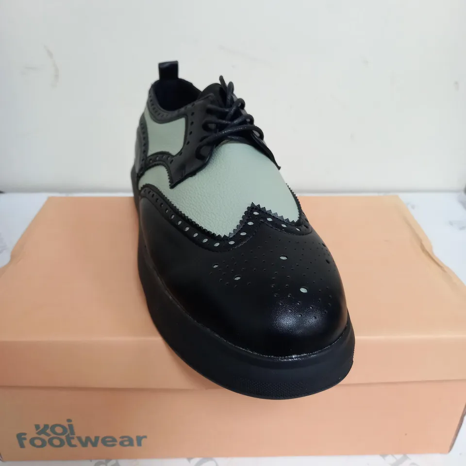 BRAND NEW BOXED PAIR OF KOI VEGAN LEATHER CORSON GREEN BROGUE DETAIL TRAINERS IN BLACK UK SIZE 8