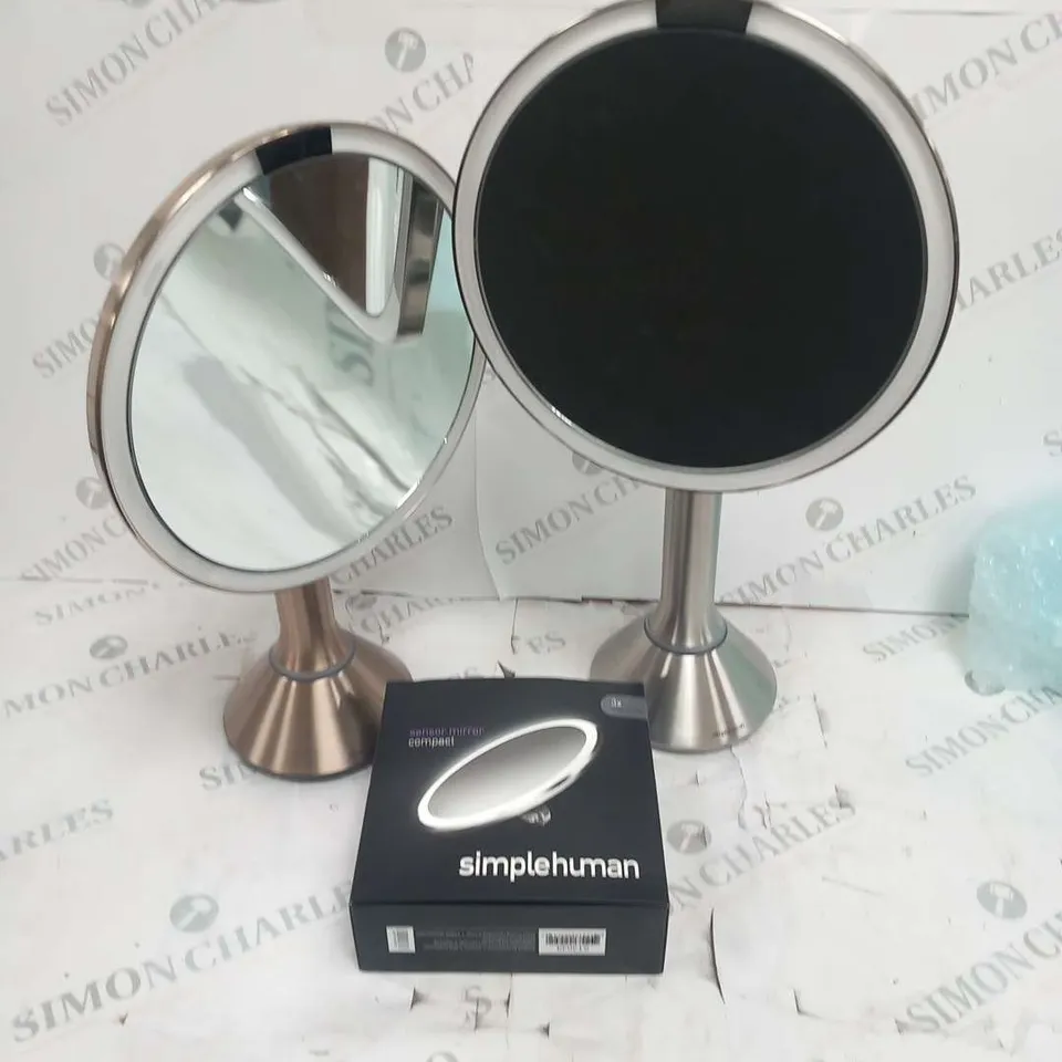 THREE ASSORTED SIMPLE HUMAN MIRRORS