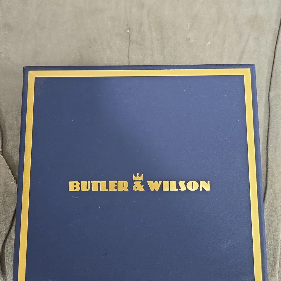 BUTLER & WILSON CRYSTAL BRACELET WITH BLACK STONES AND RHINESTONE ROSE CENTREPIECE