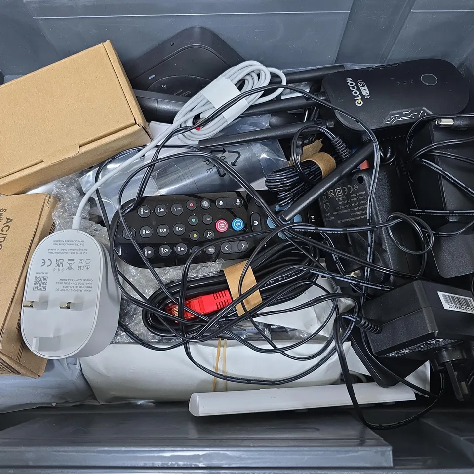 APPROXIMATELY 12 ASSORTED HOUSEHOLD ITEMS TO INCLUDE AC/DC ADAPTER, REMOTES, WIFI BOX, ETC