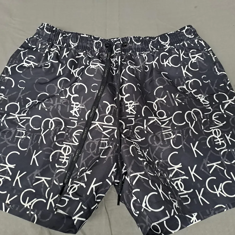 CALVIN KLEIN SWIM SHORTS IN BLACK SIZE LARGE