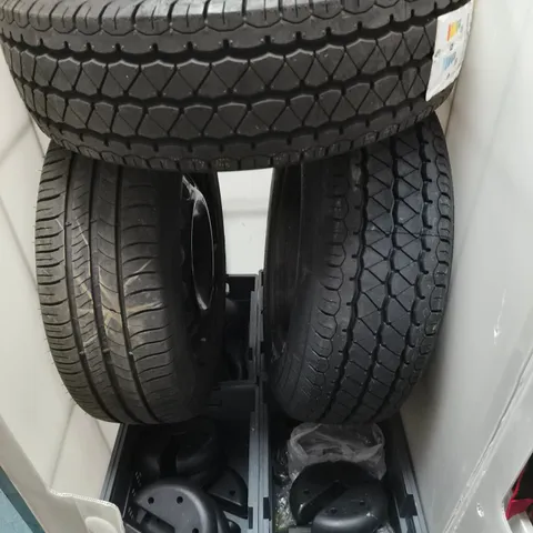 CAGE OF APPROXIMATELY 10 ASSORTED HOUSEHOLD ITEMS TO INCLUDE - CAR TYRES - WEIGHTS AND WEIGHTED PARASOL BASES - COLLECTION ONLY