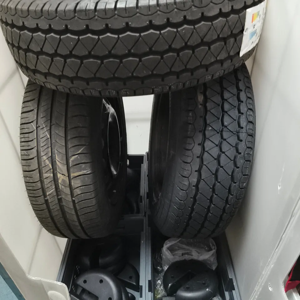 CAGE OF APPROXIMATELY 10 ASSORTED HOUSEHOLD ITEMS TO INCLUDE - CAR TYRES - WEIGHTS AND WEIGHTED PARASOL BASES - COLLECTION ONLY