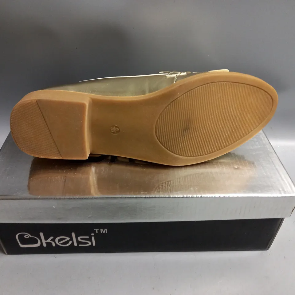 BOXED KELSI LADIES FLAT GOLD BROGUES. SIZE 6
