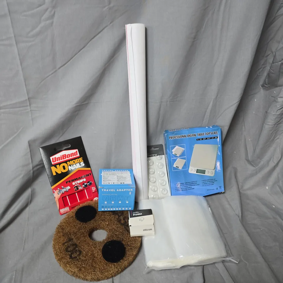 APPROXIMATELY 12 ASSORTED HOUSEHOLD ITEMS TO INCLUDE TABLE TOP SCALE, UNIBOND NO MORE NAILS, TRAVEL ADAPTOR, ETC