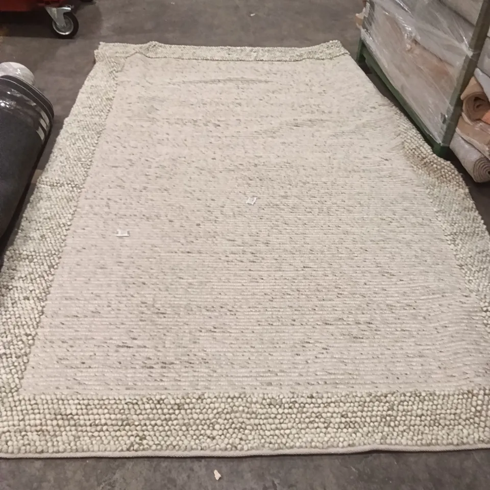 STILLAGE OF ASSORTED QUALITY RUGS APPROXIMATELY 27