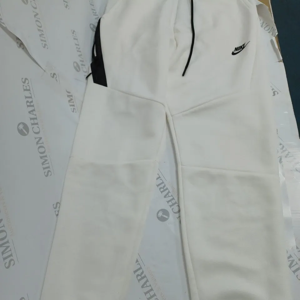 NIKE TECH FLEECE PANTS IN WHITE - MEDIUM