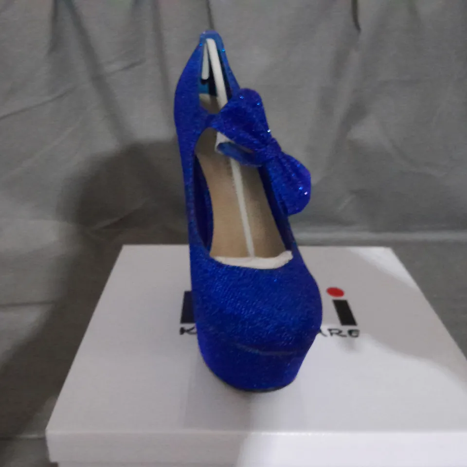 APPROXIMATELY 10 BOXED PAIRS OF KOI WEDGE SHOES IN VARIOUS SIZES TO INCLUDE SIZE 6