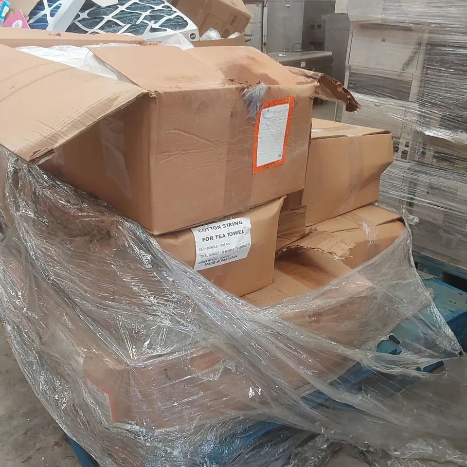 PALLET CONTAINING A VERY LARGE QUANTITY OF COTTON STRINGS FOR TEA TOWELS