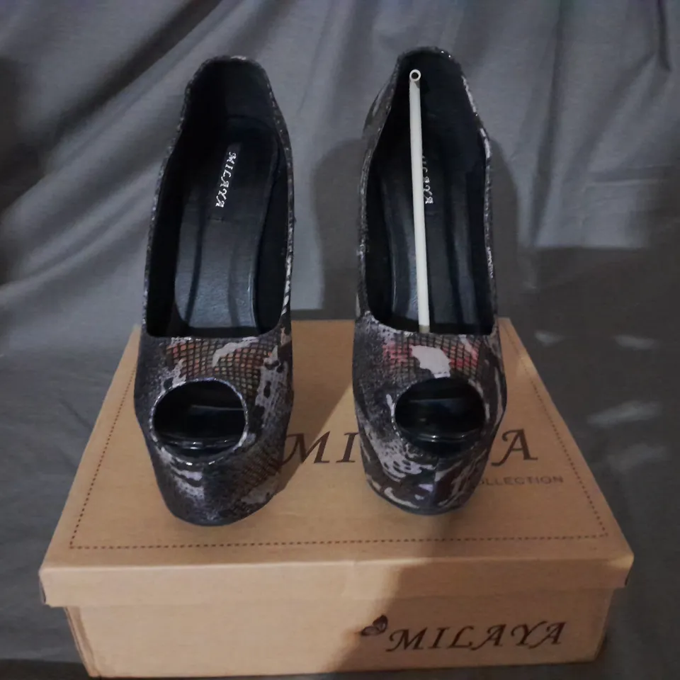 APPROXIMATELY 10 BOXED PAIRS OF TALL PLATFORM MULTICOLOUR HIGH HEELS 