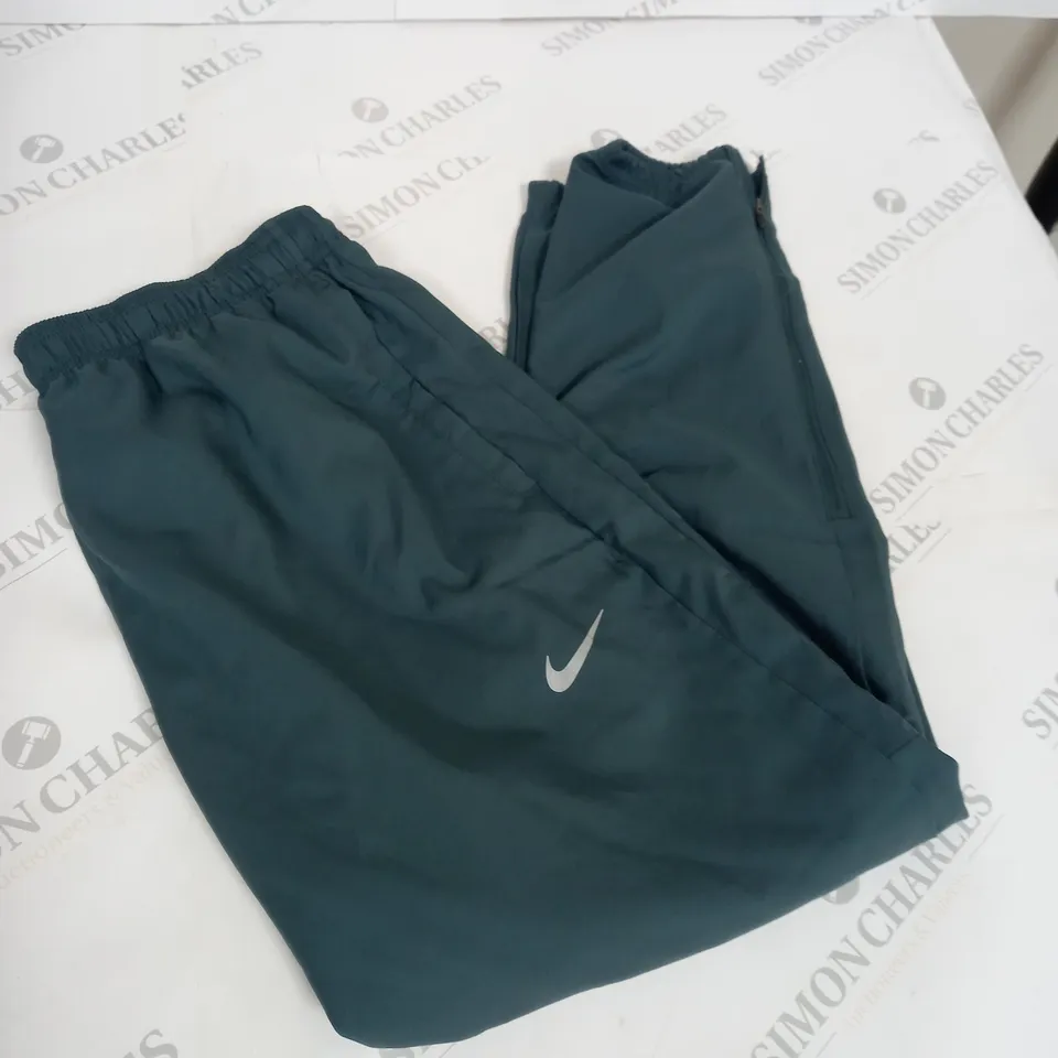GREEN NIKE TRACK PANTS SIZE L